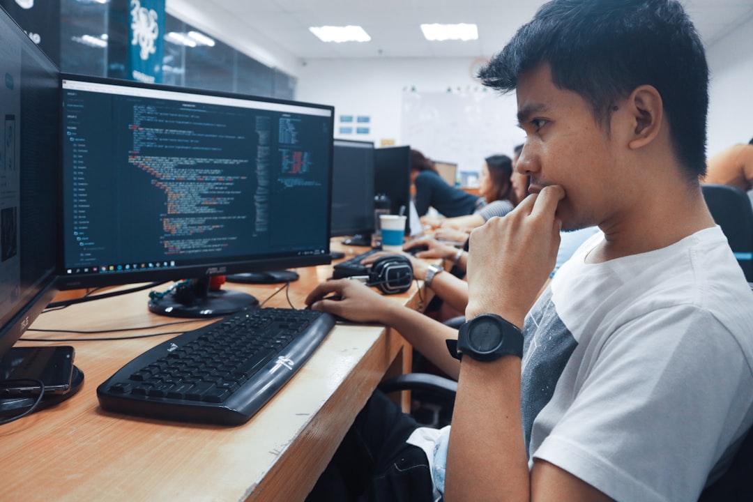 person-holding-a-computer-mouse-in-a-room-6dfebkqstia